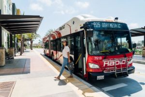 woman leaves BRT 225 chula vista bus