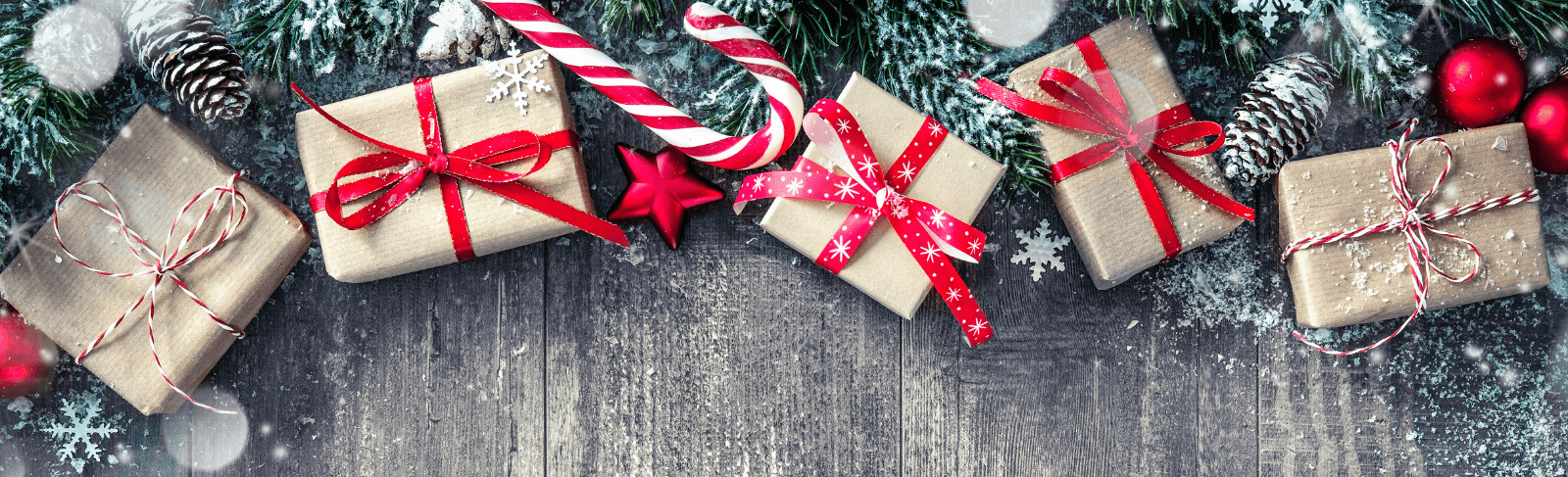 presents in brown paper with red ribbon